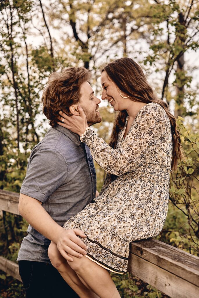 Couple embracing in the forest 