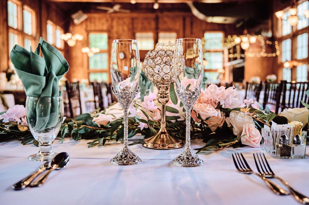 Gold Champagne flutes for the bride and groom at Wellers in Saline, Michigan. Photo taken by  
