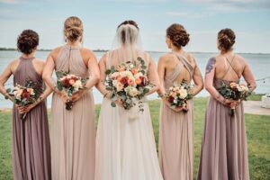 Bride with Bridesmaids outside of Silver Shores in Wyandotte, Michigan