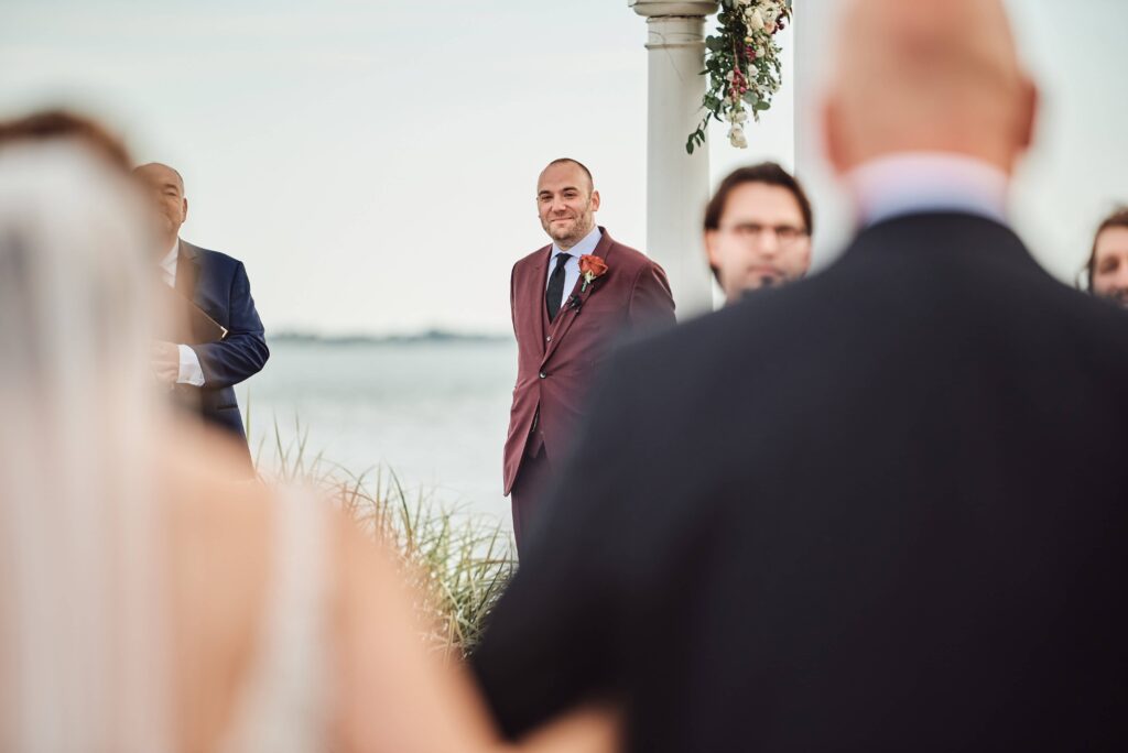 Groom looks on at Silver Shores in Wyandotte, Michigan