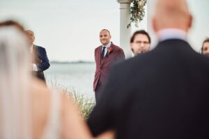 Groom looks on at Silver Shores in Wyandotte, Michigan