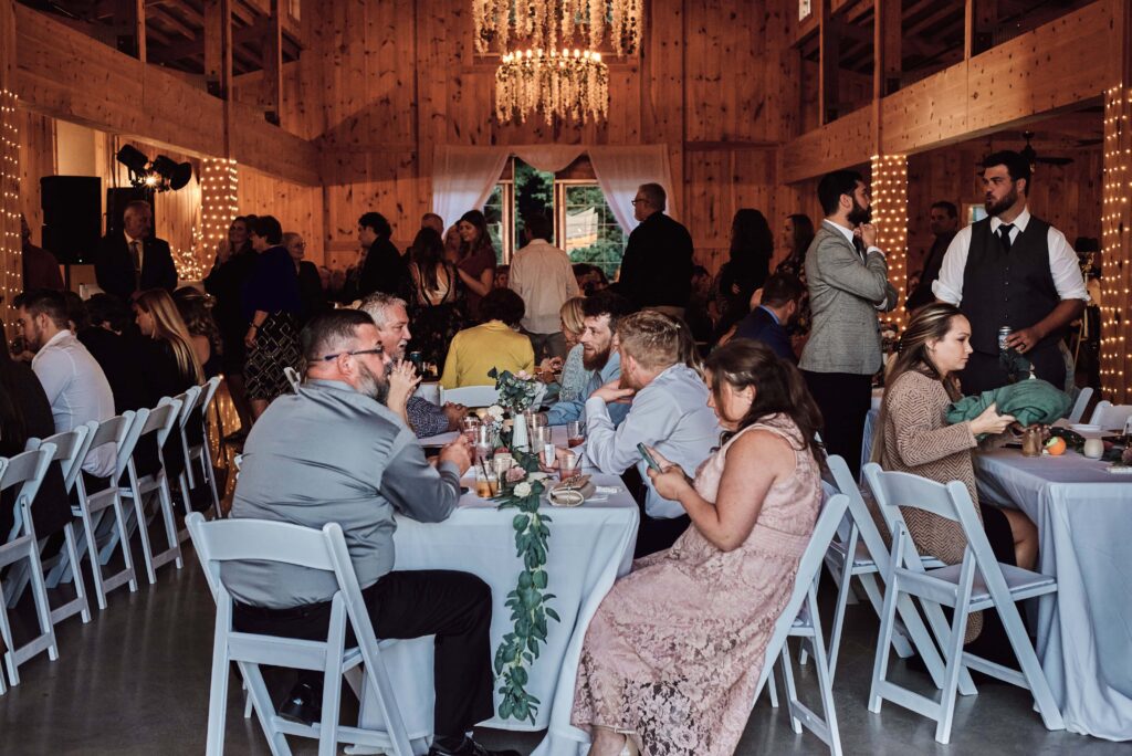 Guests mingle at Sunset Hill Wedding Barn