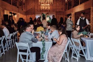 Guests mingle at Sunset Hill Wedding Barn
