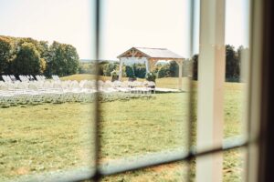 Looking through the window of Sunset Hill Wedding Barn in Central Lake, Michigan