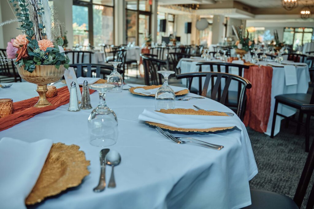 Wide spread of tables in reception hall at Lapeer Country Club
