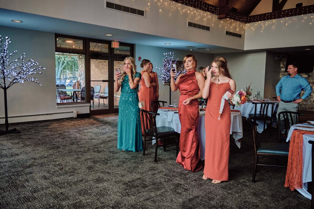 Mothers of the bride and their emotional reactions during the father and daughter first look at Lapeer Country Club